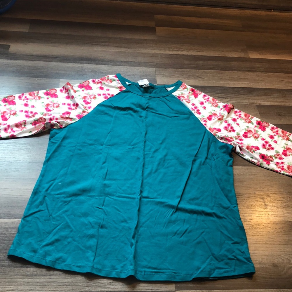 Sunshine and rodeos teal blue flower top